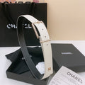 CHANEL BELT 30MM IN BLACK AND WHITE CALFSKIN WITH INTERWOVEN GOLD CHAIN BUCKLE